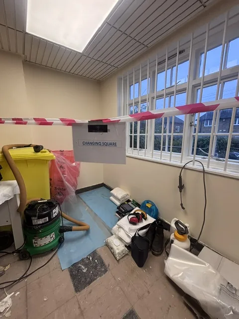 Asbestos floor tile and bitumen removal in East Finchley